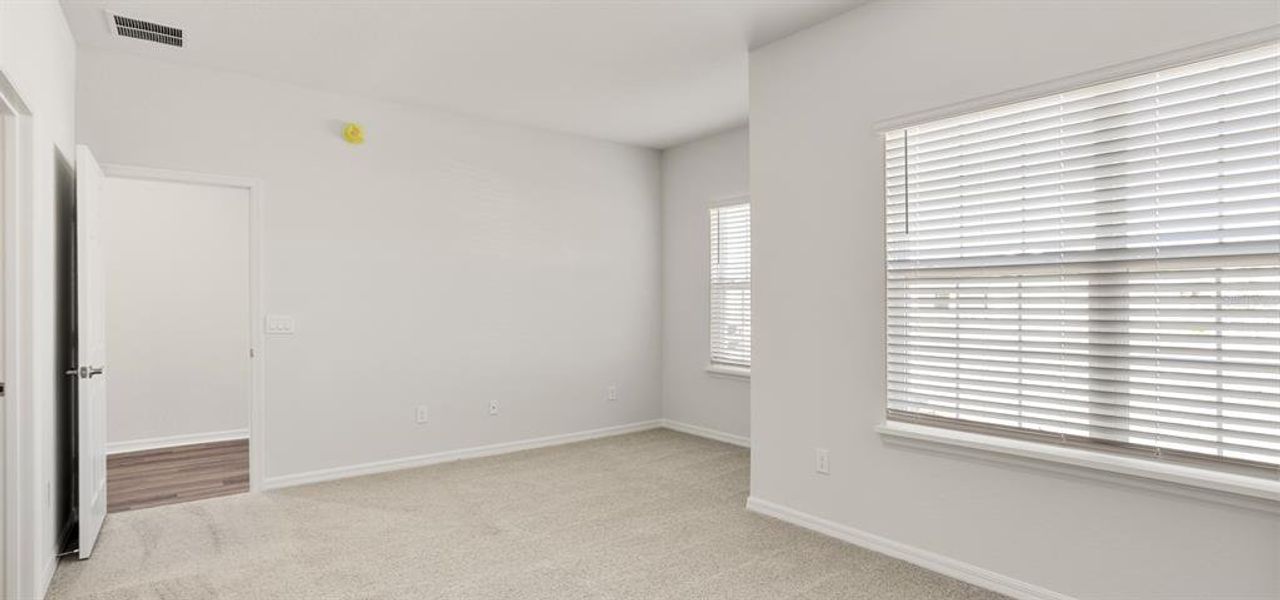 Spacious, unfurnished interior of a new home in The Crossings - Single-Family Homes, St. Cloud (Image 34).