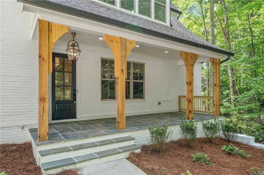 Front exterior of a new home in , Holly Springs, GA, highlighting curb appeal (Image 28). Front exterior of a new home in , Holly Springs, GA, highlighting curb appeal (Image 28).