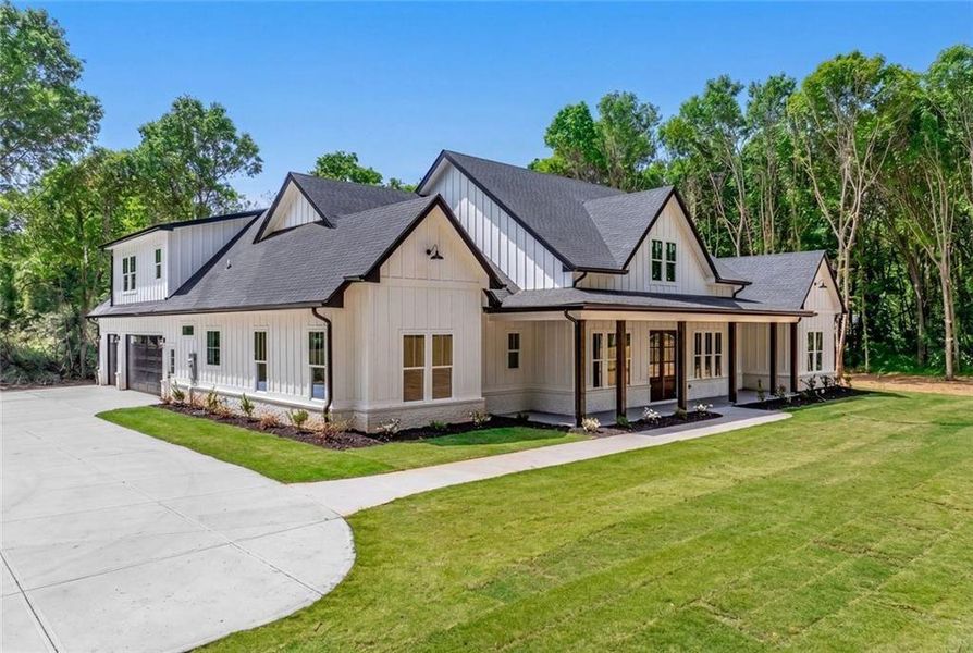 Front exterior of a new home in , Monroe, GA, highlighting curb appeal (Image 28).