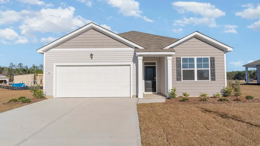 Representative exterior photo of a completed home built from the Aria by D.R. Horton in Sandpiper Place, Myrtle Beach, SC (Image 13). Representative exterior photo of a completed home built from the Aria by D.R. Horton in Sandpiper Place, Myrtle Beach, SC (Image 13).