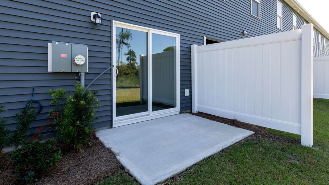 Exterior details and patio area of a home in The Landing at Sidbury Station, Castle Hayne (Image 2). Exterior details and patio area of a home in The Landing at Sidbury Station, Castle Hayne (Image 2).