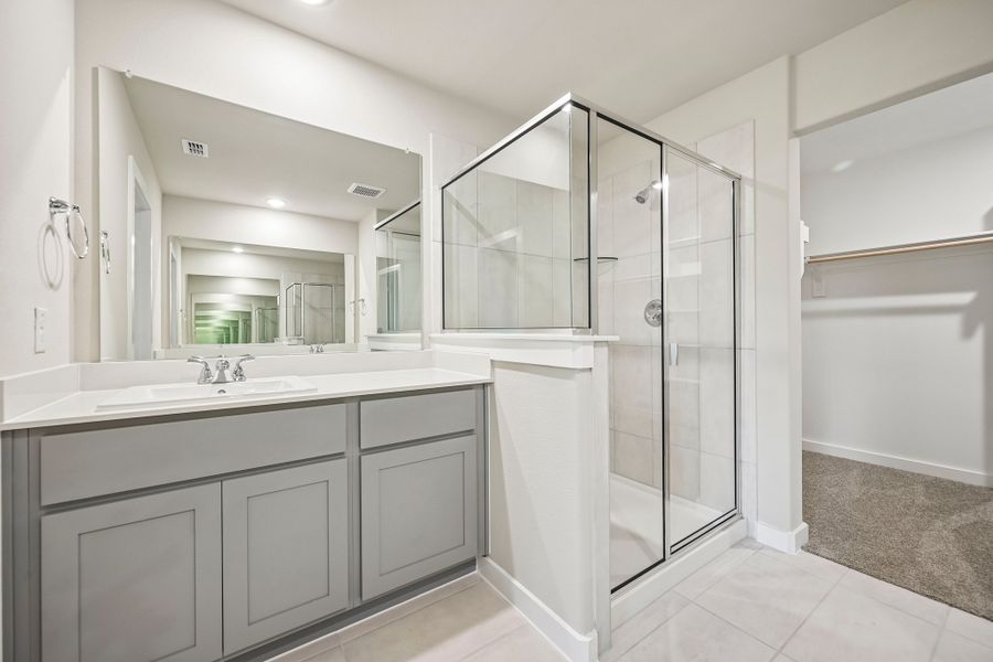 Primary Bathroom in the Harrison home plan by Trophy Signature Homes