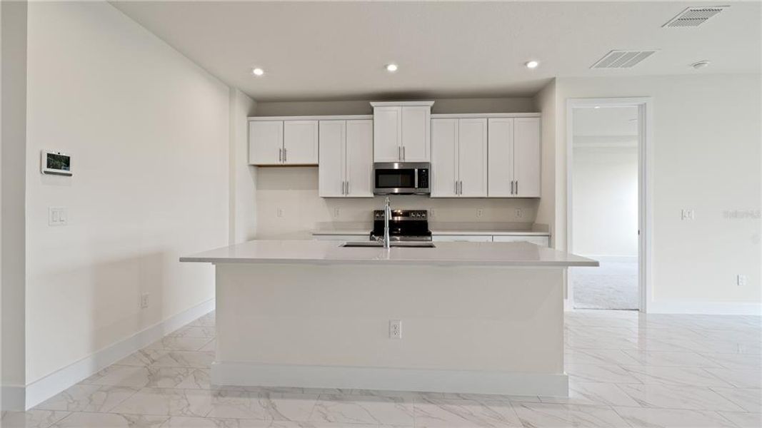 Furnished interior view inside a new home in Trailside, Mount Dora (Image 4).