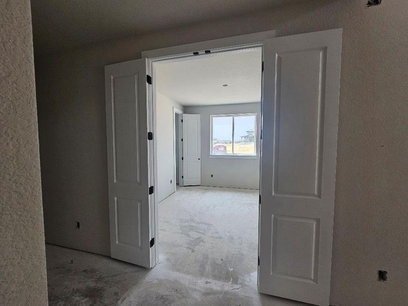 Corridor with unfinished concrete floors Corridor with unfinished concrete floors