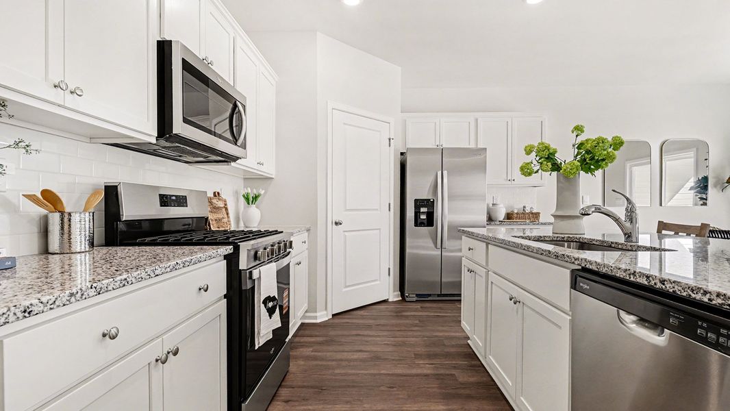 Furnished interior view inside a new home in Brunswick Plantation, Ash (Image 8).