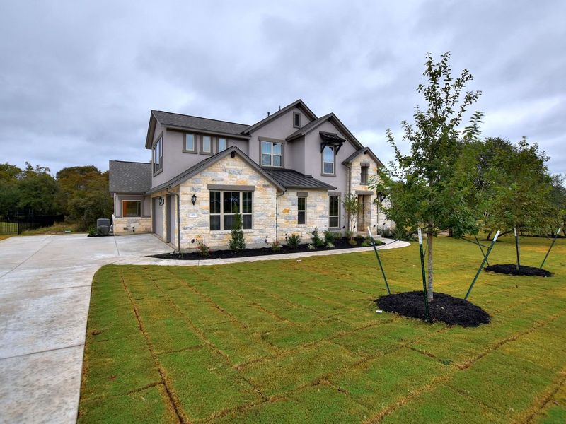 Representative exterior photo of a completed home built from the Madera II by Giddens Homes in Scofield Farms Estates, Georgetown, TX (Image 58).