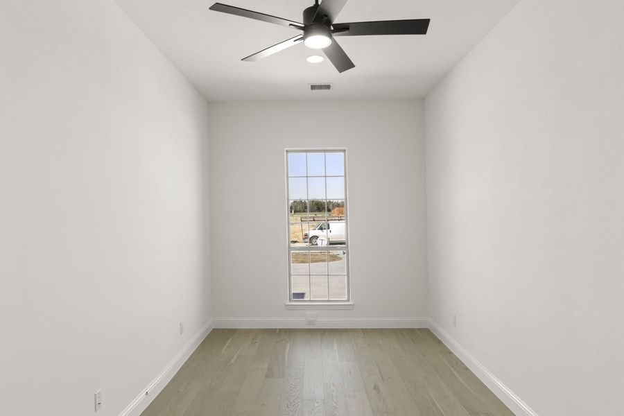 Representative unfurnished interior of a home built from the Somerset by Windsor Homes in Winding Creek, Rockwall (Image 19).