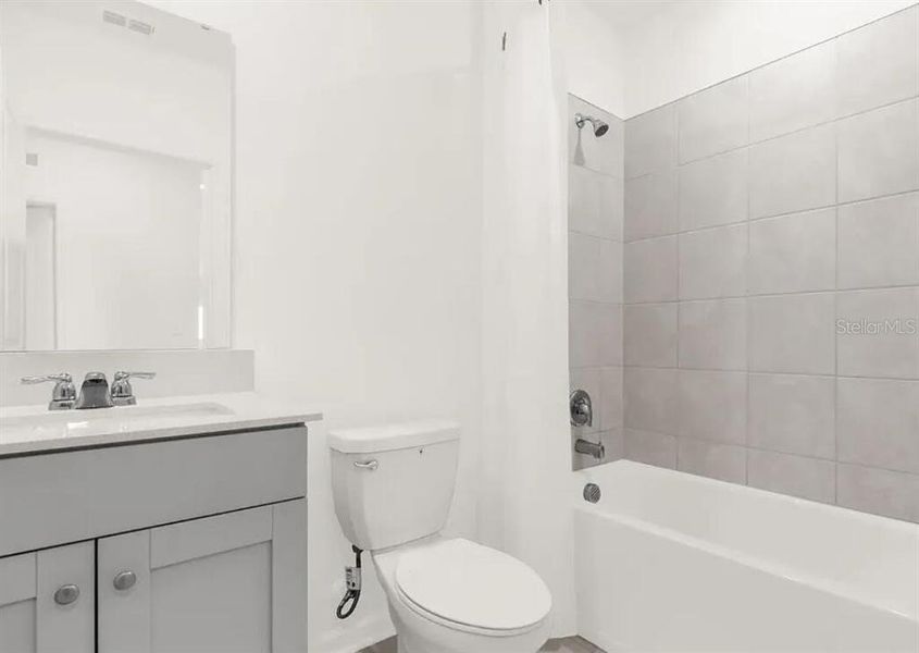 Furnished interior view inside a new home in Lawson Dunes, Haines City (Image 13).