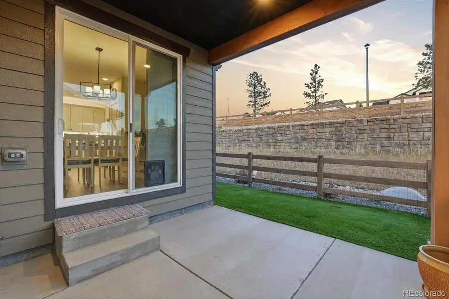 There is a gas line to the left of the sliding glass door for easy access to the kitchen and dining area from the grill.