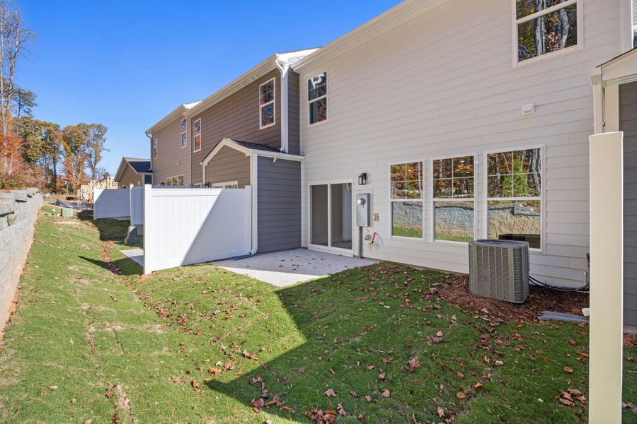 Exterior details and patio area of a home in Harbor Crossing, Greensboro (Image 26).