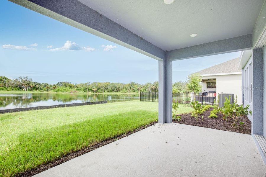 Exterior details and patio area of a home in Indigo Creek, Apollo Beach (Image 28).