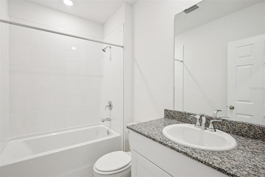 Furnished interior view inside a new home in Villamar - Signature Series, Winter Haven (Image 10).