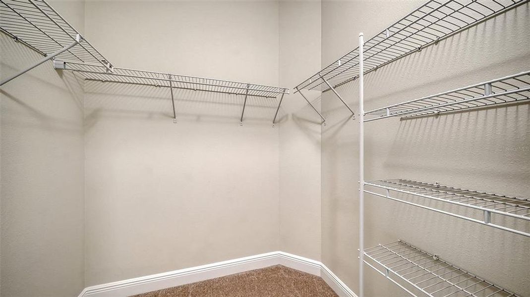 Spacious, unfurnished interior of a new home in Vicenza Real Estate and Homes for Sale in North Venice, FL - Neal Communities, Nokomis (Image 25).