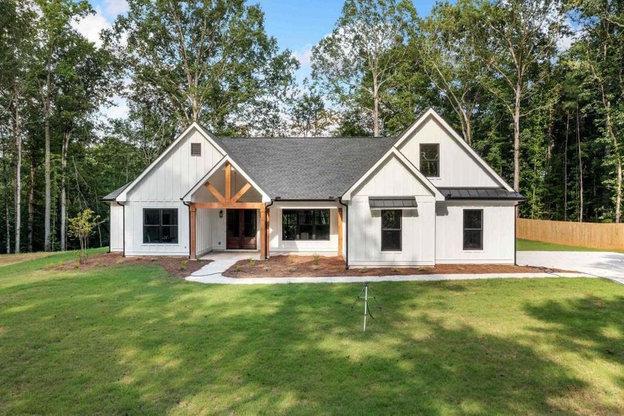 Front exterior of a new home in , Jackson, GA, highlighting curb appeal (Image 2).