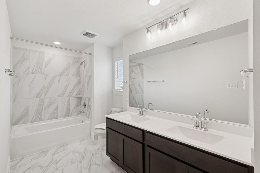 Furnished interior view inside a new home in Sorella, Tomball (Image 4).