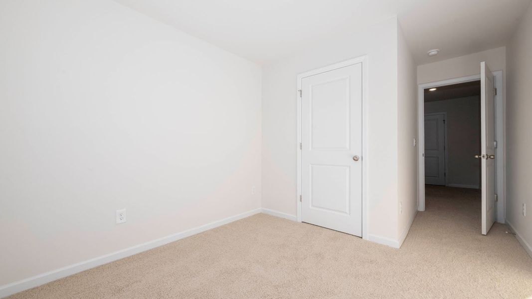 Spacious, unfurnished interior of a new home in North Village Townes, Greensboro (Image 13).