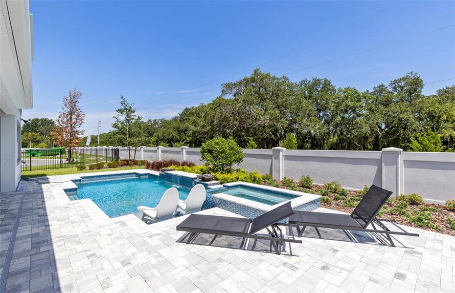 Exterior details and patio area of a home in The Estates at Nona Sound, Orlando (Image 2). Exterior details and patio area of a home in The Estates at Nona Sound, Orlando (Image 2).