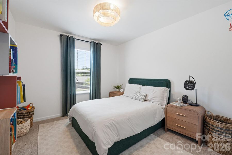 Bedroom 3, wall shelves convey