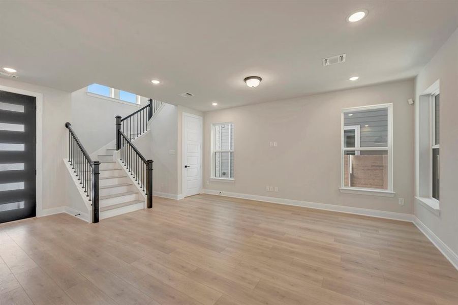 Spacious, unfurnished interior of a new home in Painted Tree Woodland West – Cottages, McKinney (Image 22).