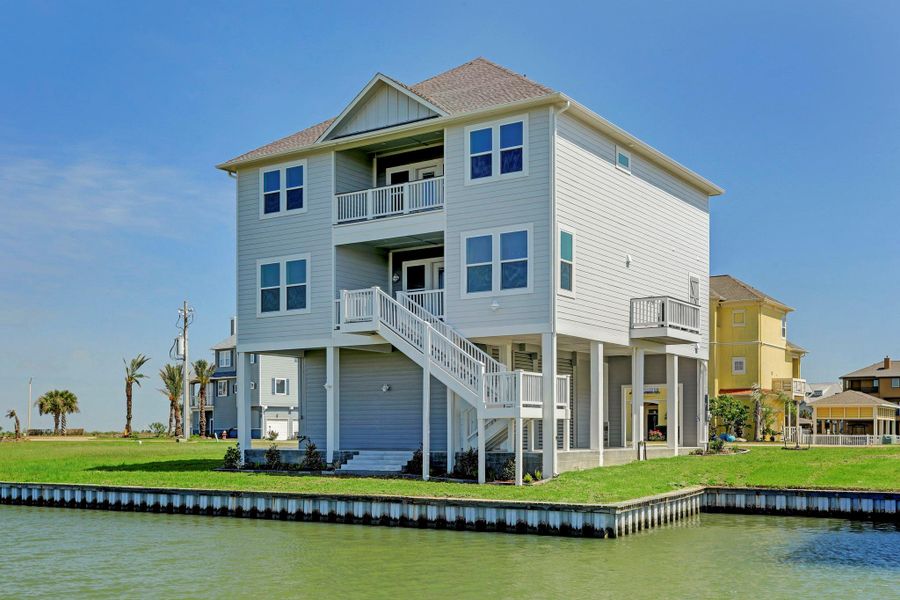 Another angle of the waterside and the boat slip to the right of the picture. Boathouse accommodations allow for a 30' boathouse. You may also build a fish/sun dock along the bulkhead. It can be 50% (33 feet) of the bulkhead in length and 8' deep. Another angle of the waterside and the boat slip to the right of the picture. Boathouse accommodations allow for a 30' boathouse. You may also build a fish/sun dock along the bulkhead. It can be 50% (33 feet) of the bulkhead in length and 8' deep.
