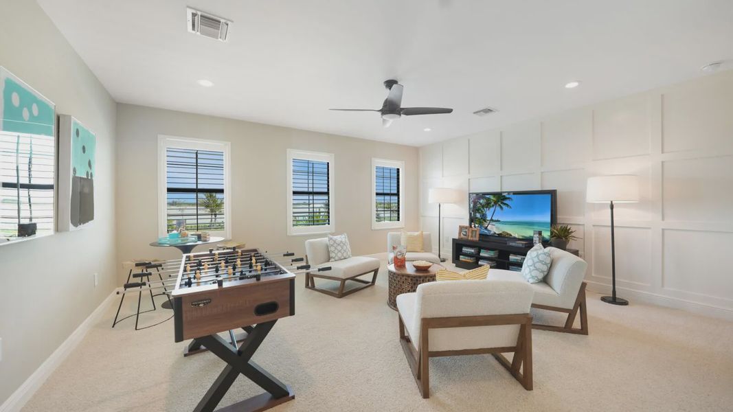 Representative furnished interior of a home built from the Artistry by Neal Communities in SkySail, Naples (Image 15).