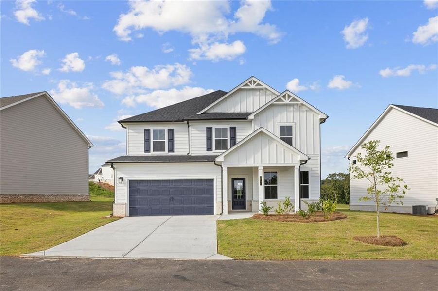 Front exterior of a new home in The Estates at Gainesville Township, Gainesville, GA, highlighting curb appeal (Image 19).