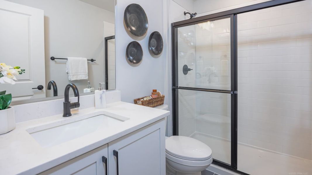 Representative furnished interior of a home built from the Cambridge by Epcon Communities in The Courtyards at Oak Grove, Durham (Image 21).