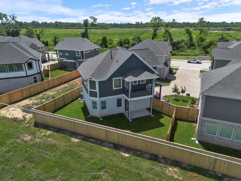 Front exterior of a new home in Sienna, Missouri City, TX, highlighting curb appeal (Image 13). Front exterior of a new home in Sienna, Missouri City, TX, highlighting curb appeal (Image 13).
