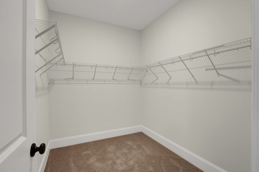 Representative unfurnished interior of a home built from the Sinclair by Bill Clark Homes in Osprey Landing, Southport (Image 20).