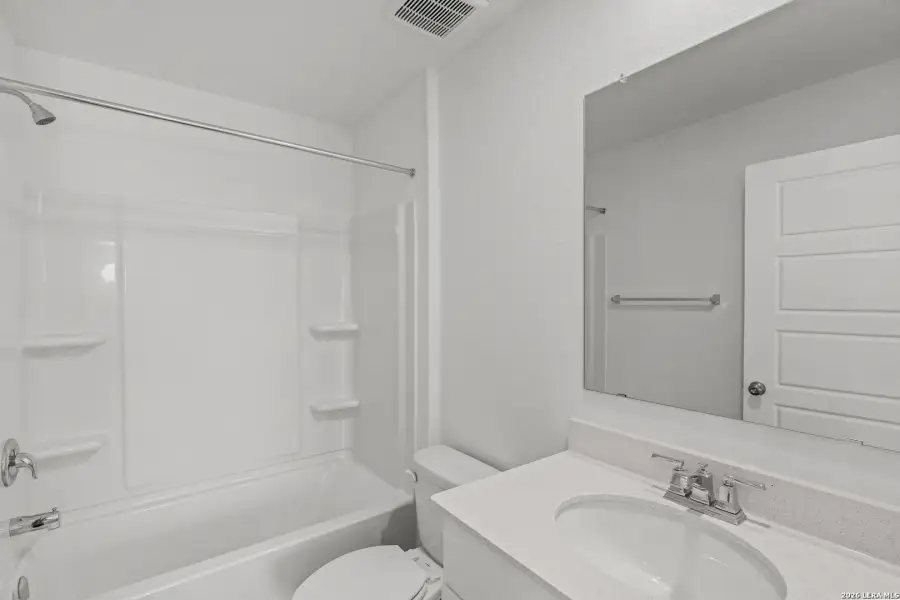Furnished interior view inside a new home in Cinco Lakes, San Antonio (Image 12).