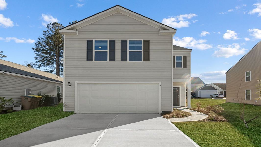 Front exterior of a new home in Rice Hope, Port Wentworth, GA, highlighting curb appeal (Image 1). Front exterior of a new home in Rice Hope, Port Wentworth, GA, highlighting curb appeal (Image 1).