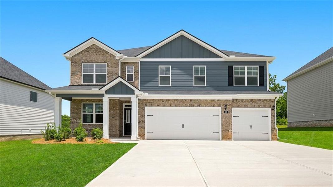 Front exterior of a new home in Evergreen Crossing, Locust Grove, GA, highlighting curb appeal (Image 1). Front exterior of a new home in Evergreen Crossing, Locust Grove, GA, highlighting curb appeal (Image 1).