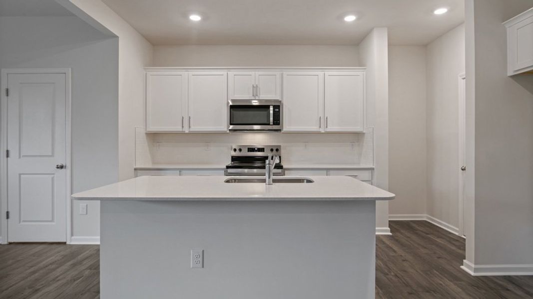 Furnished interior view inside a new home in The Grove at Matthews Landing, Fuquay Varina (Image 4).