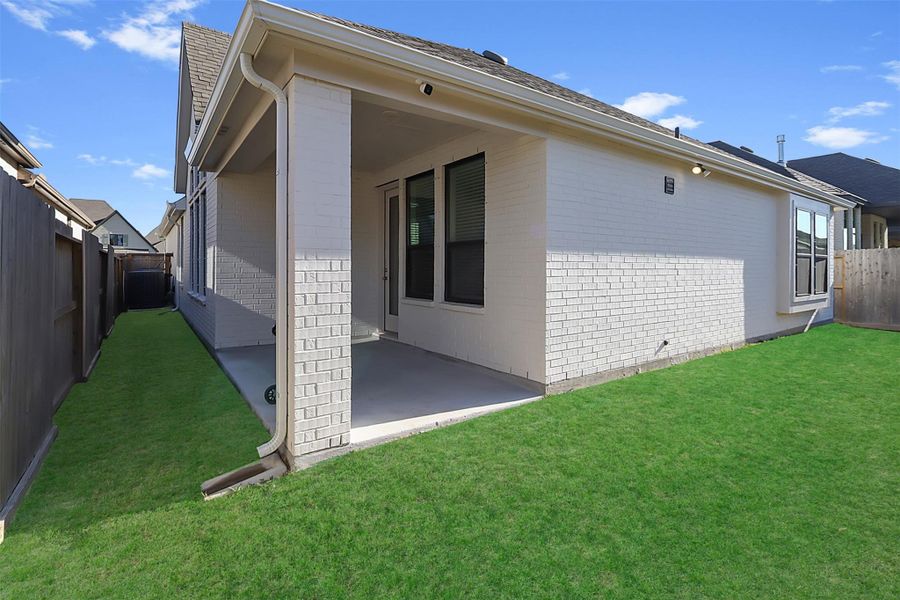 Exterior details and patio area of a home in Riceland: 50ft. lots, Mont Belvieu (Image 24).