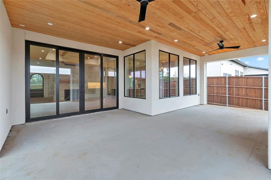 View of patio featuring ceiling fan