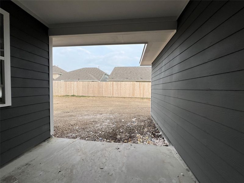 Exterior details and patio area of a home in Rolling Glen, Hutto (Image 1).