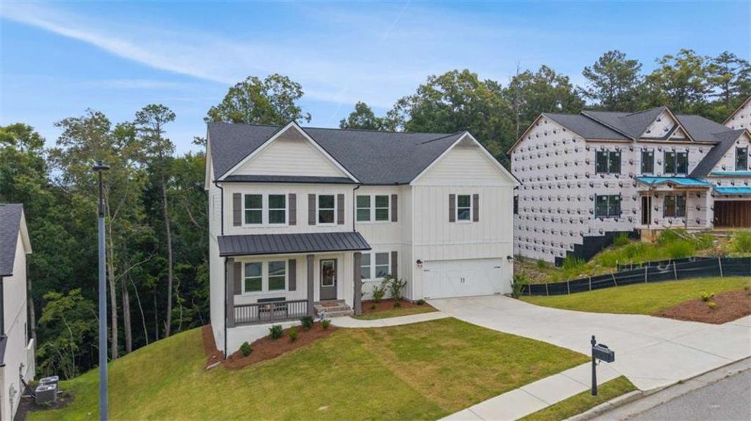Front exterior of a new home in Silvercrest Lakes, Acworth, GA, highlighting curb appeal (Image 30).