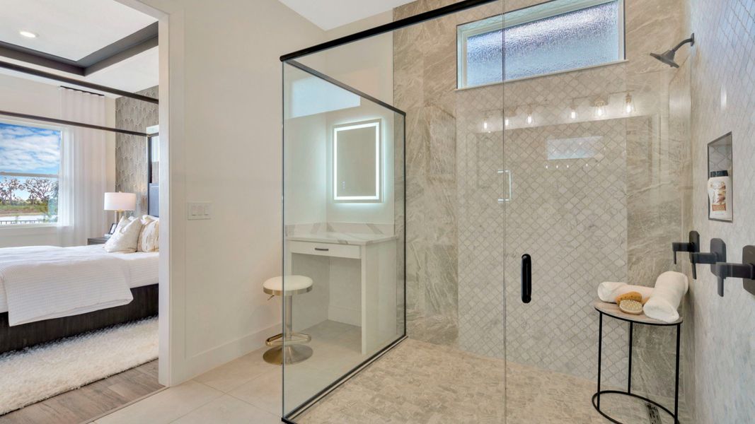 The Primary Bathroom of a DRB Homes Grand Eider model, which is a home plan offered at Serengeti in Spring Hill, FL.