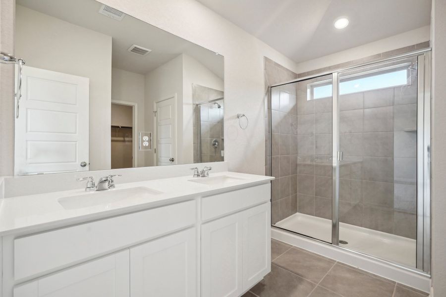 Primary suite bathroom in the Allen floorplan at a Meritage Homes community.