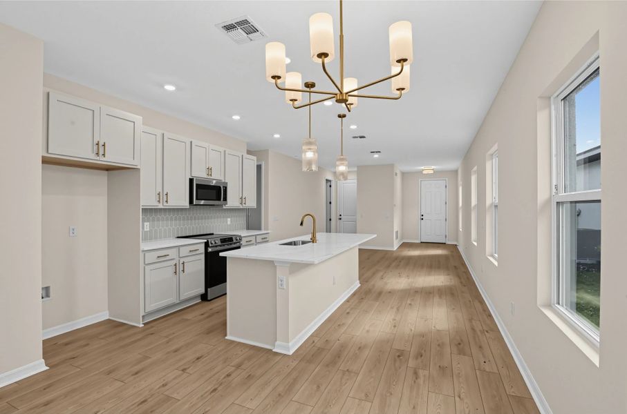 Furnished interior view inside a new home in Catamaran Cove, Rockledge (Image 7).
