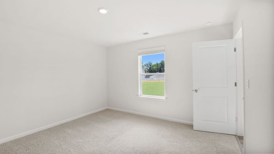 Spacious, unfurnished interior of a new home in Varner Station, Woodruff (Image 31).