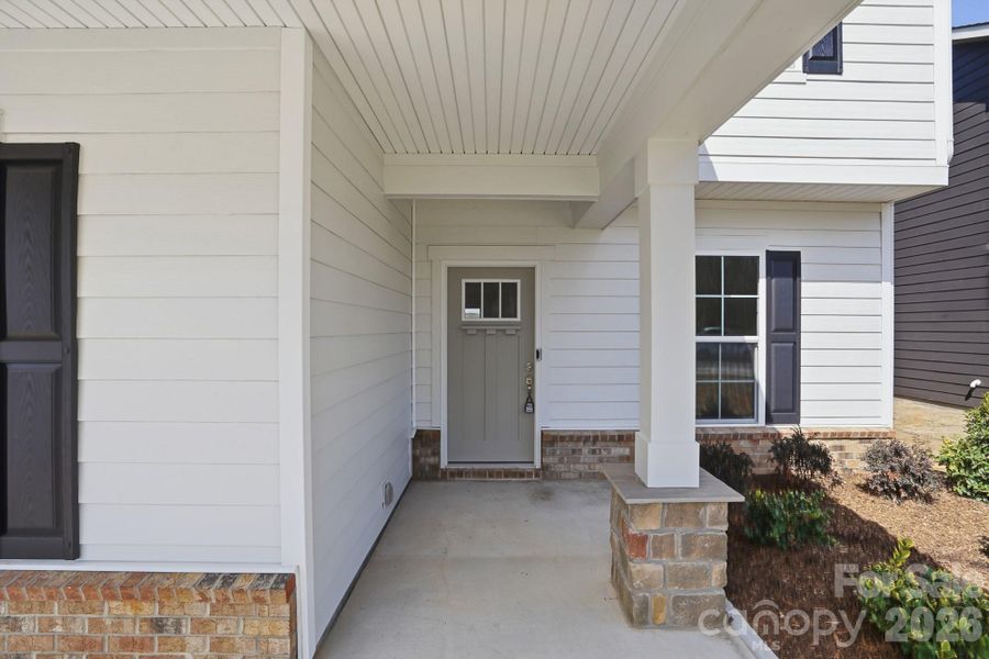 Exterior details and patio area of a home in Forest Creek, Waxhaw (Image 3).
