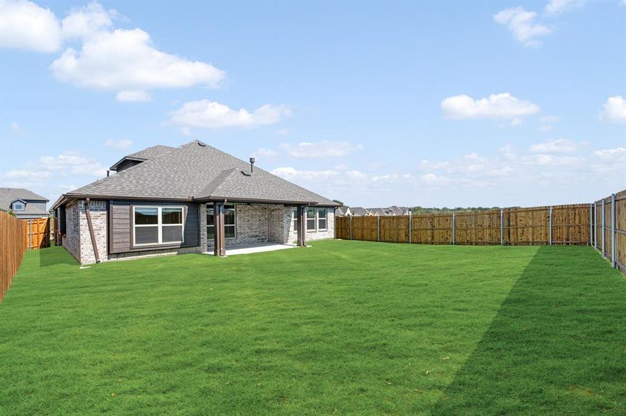 Exterior details and patio area of a home in East Oak Creek 50-55, Commerce (Image 4). Exterior details and patio area of a home in East Oak Creek 50-55, Commerce (Image 4).
