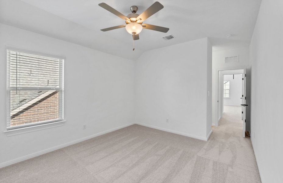 Spacious, unfurnished interior of a new home in Bluffview Reserve, Leander (Image 56).