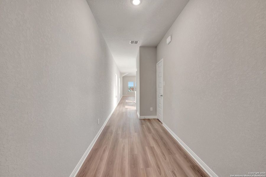 Spacious, unfurnished interior of a new home in Paloma Park, Converse (Image 30).