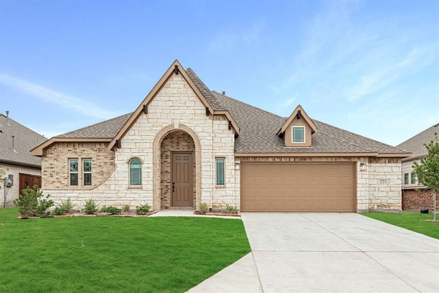 Front exterior of a new home in East Oak Creek 60-65, Commerce, TX, highlighting curb appeal (Image 19). Front exterior of a new home in East Oak Creek 60-65, Commerce, TX, highlighting curb appeal (Image 19).