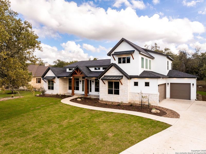 Front exterior of a new home in , San Antonio, TX, highlighting curb appeal (Image 1). Front exterior of a new home in , San Antonio, TX, highlighting curb appeal (Image 1).