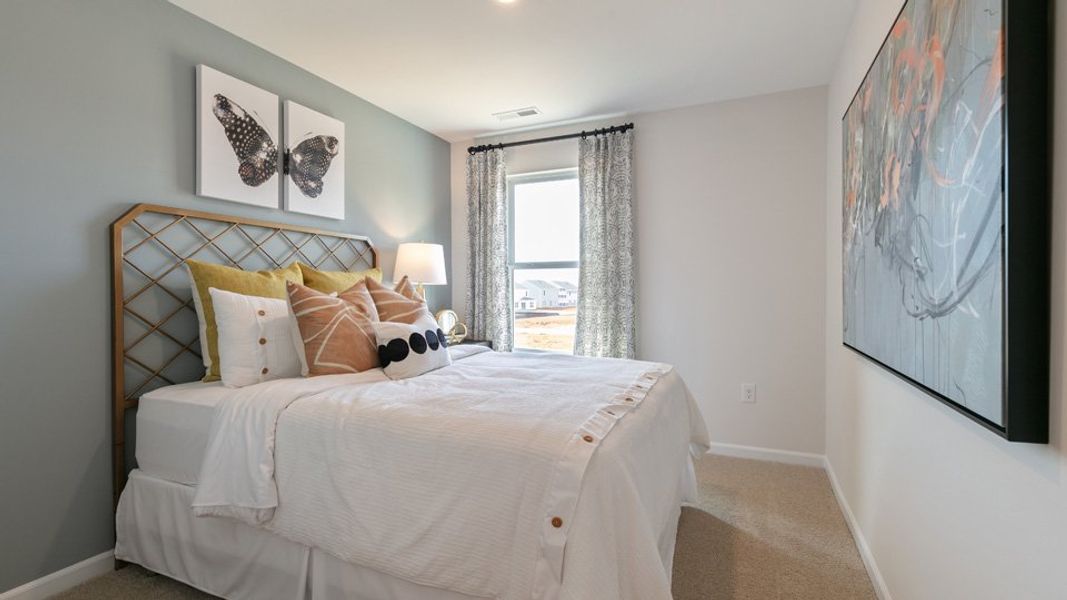 Furnished interior view inside a new home in The Townes at Ridgewood Farms, Winterville (Image 31).