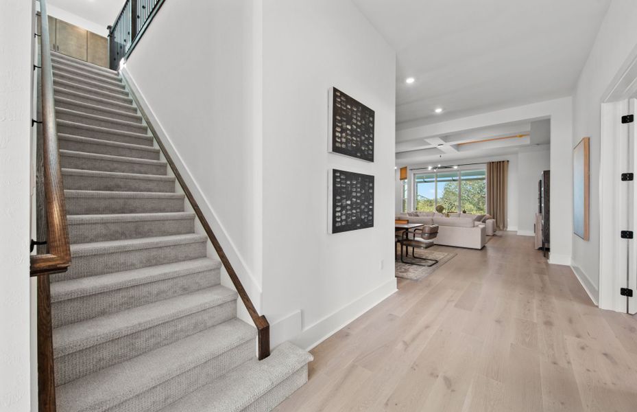 Representative unfurnished interior of a home built from the Layton Grande by DiVosta in BeachWalk by Manasota Key, Englewood (Image 20).