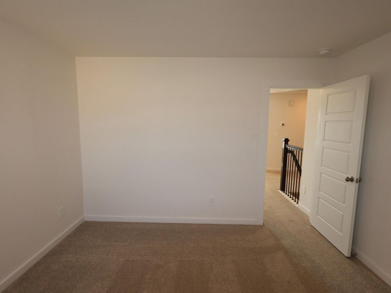 Spacious, unfurnished interior of a new home in Pinewood at Grand Texas, New Caney (Image 9).